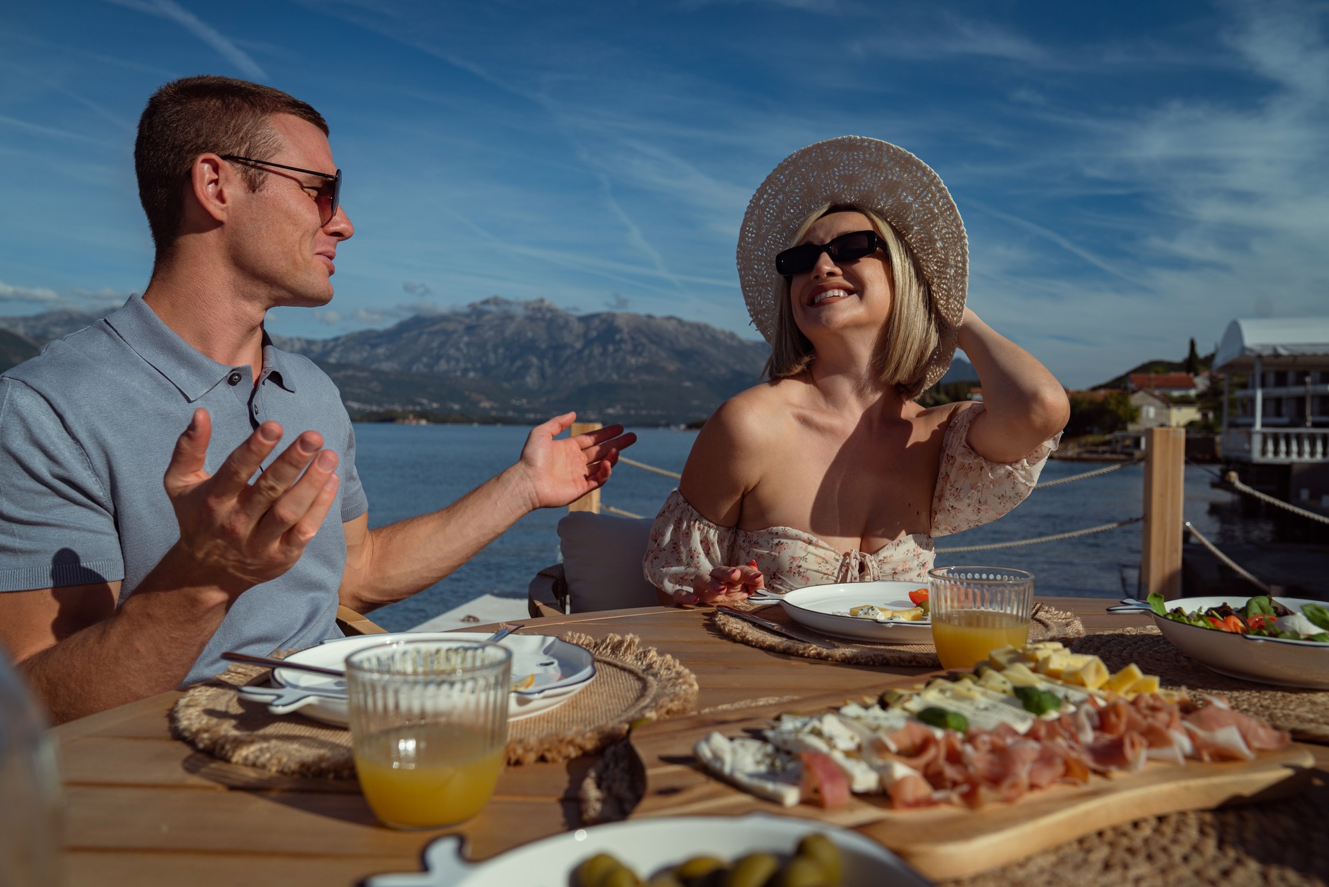 Seaside dining: romantic meal on the dock of a luxury coastal home